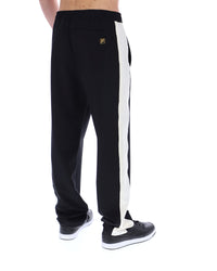 Black track pants with a white stripe on a white background