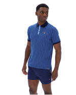 Man wearing a blue striped polo shirt and shorts on a white background