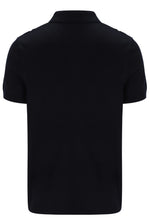 Black polo shirt on a white background