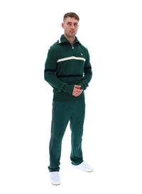 Displays a model wearing the Rain Forest 'FILA' branded Camilo Knitted Half Zip Jumper