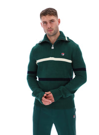 Displays a model wearing the Rain Forest 'FILA' branded Camilo Knitted Half Zip Jumper