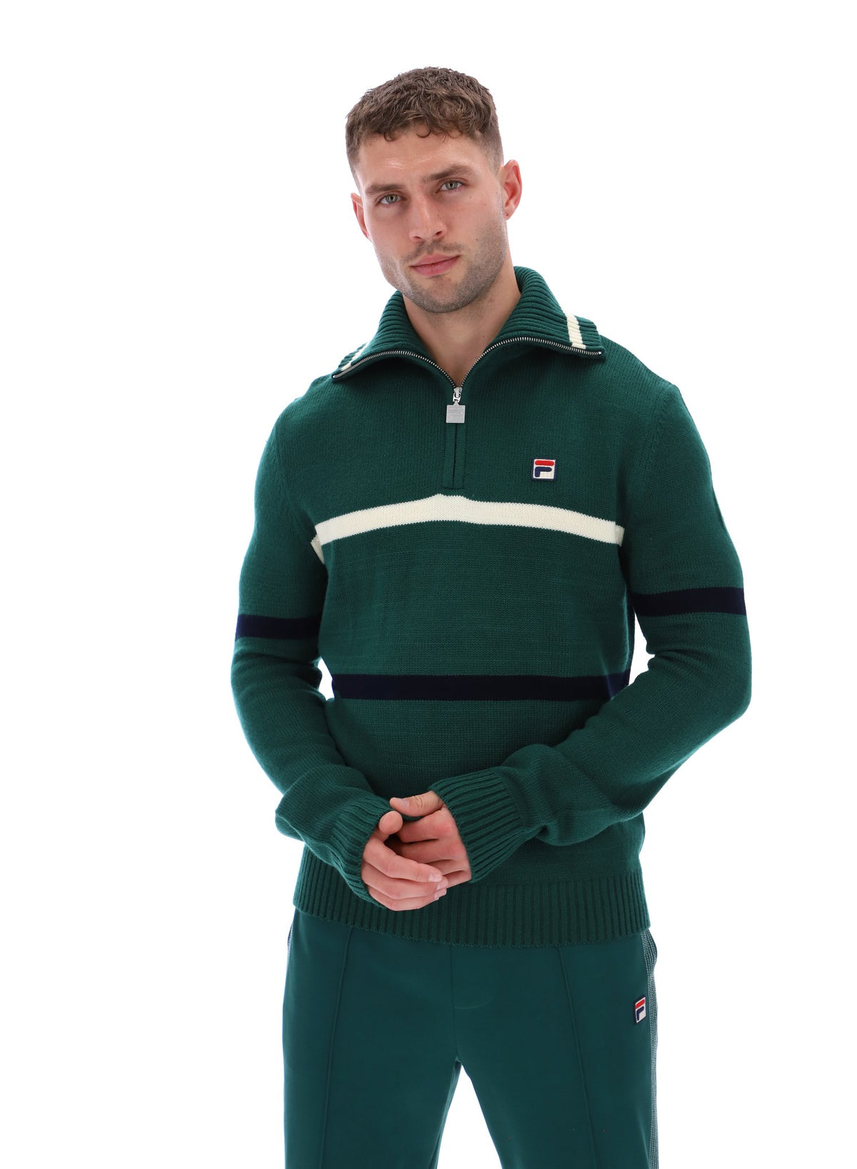 Displays a model wearing the Rain Forest 'FILA' branded Camilo Knitted Half Zip Jumper