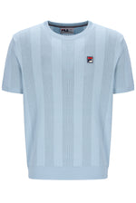 Light blue textured t-shirt with a small logo on a white background