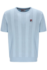 Light blue textured t-shirt with a small logo on a white background