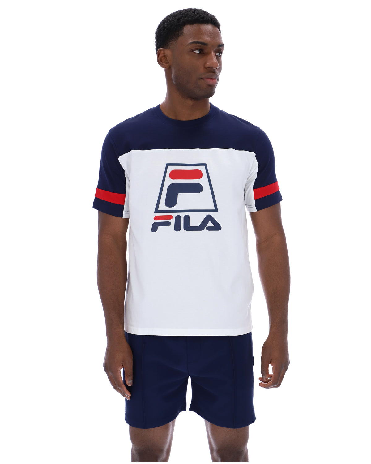 Displays a model wearing the White 'FILA' branded Damon Cut and Sew Tee