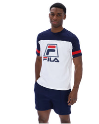 Displays a model wearing the White 'FILA' branded Damon Cut and Sew Tee