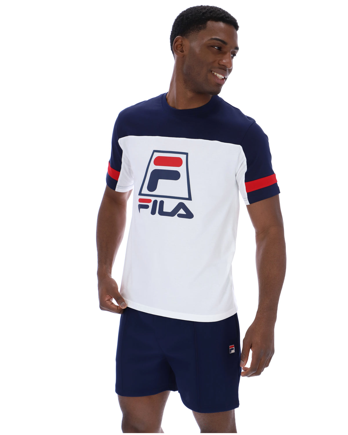 Displays a model wearing the White 'FILA' branded Damon Cut and Sew Tee
