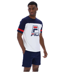 Displays a model wearing the White 'FILA' branded Damon Cut and Sew Tee