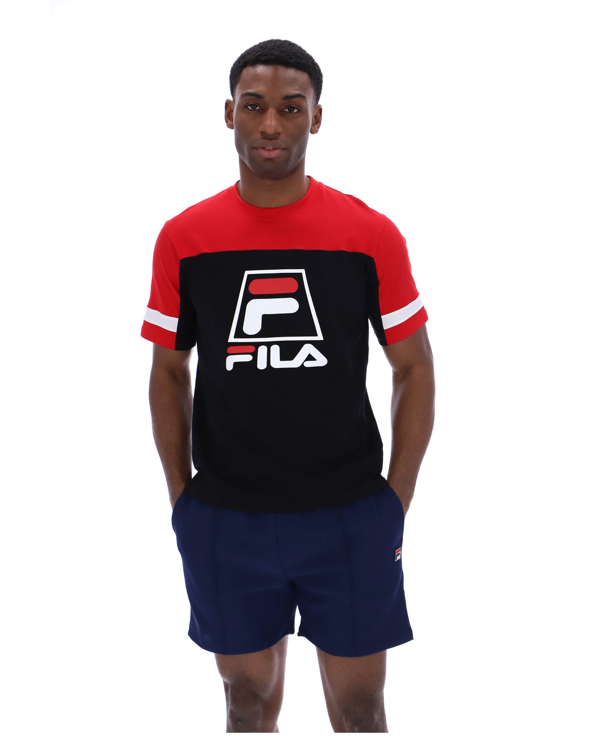 Displays a model wearing the Black 'Fila' branded Damon Cut and Sew Tee