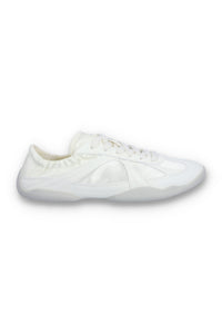 White Fila shoe on a white background.