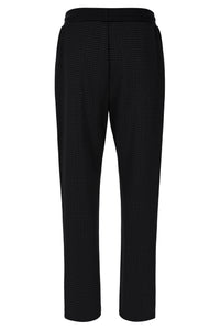 Black textured pants on a white background