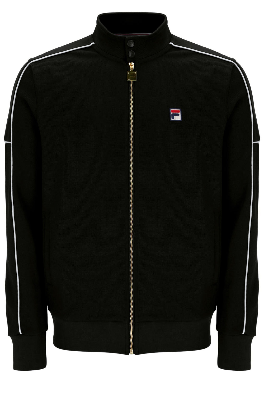 A black Fila track jacket with white contrast piping along the shoulders and sleeves, featuring a gold-tone zipper and a small Fila logo patch on the left chest.