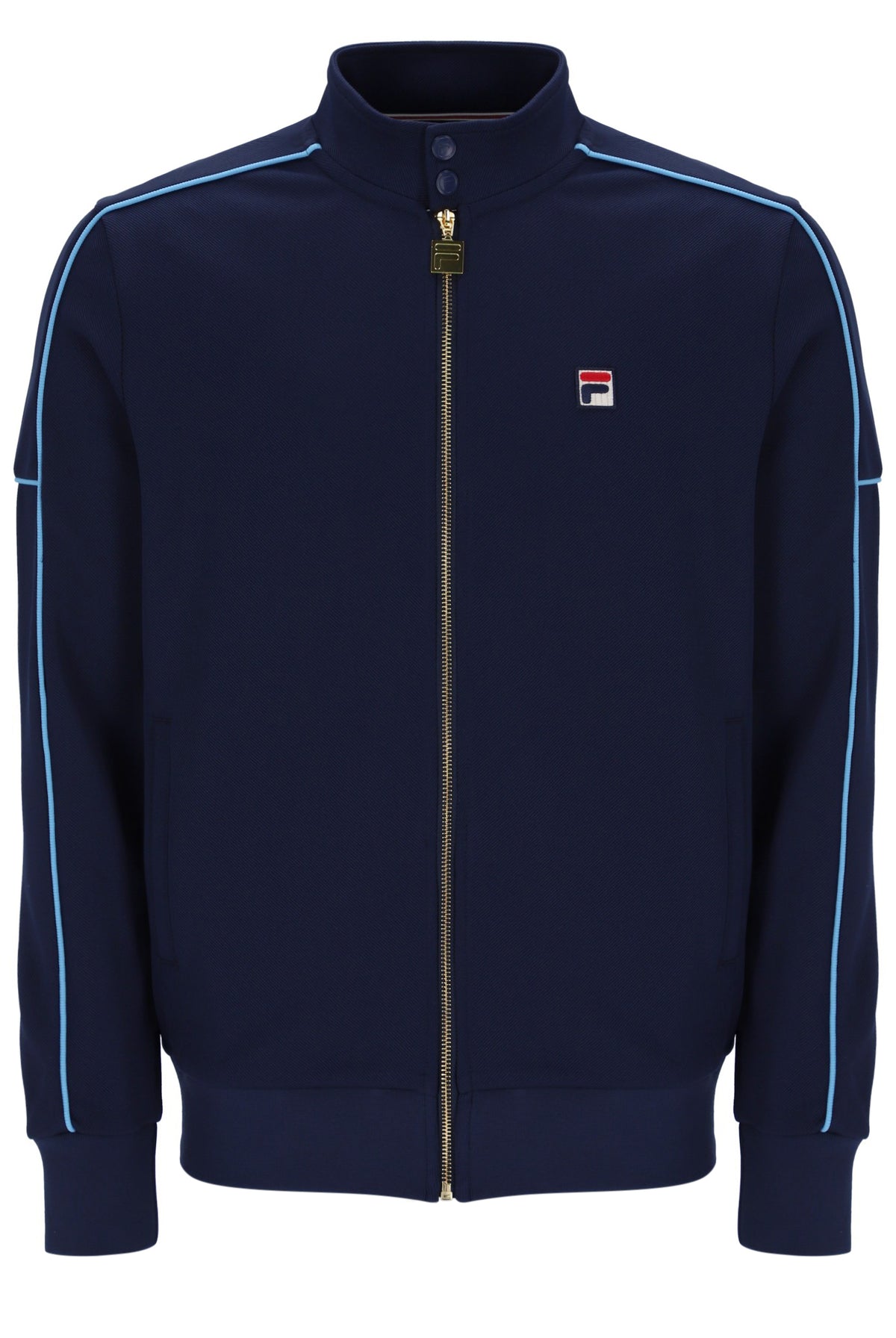 A navy blue Fila zip-up track jacket with light blue piping along the shoulders and sleeves, featuring a small Fila logo patch on the left chest.
