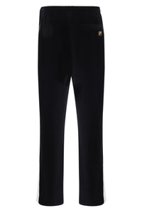 Displays the Black 'FILA' branded Fario Velour Track Pant