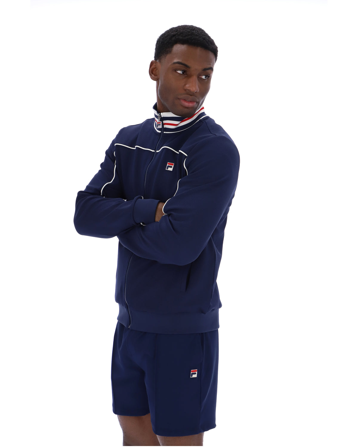 Displays a model wearing the Navy 'FILA' Federico Tipped Neck Track Top
