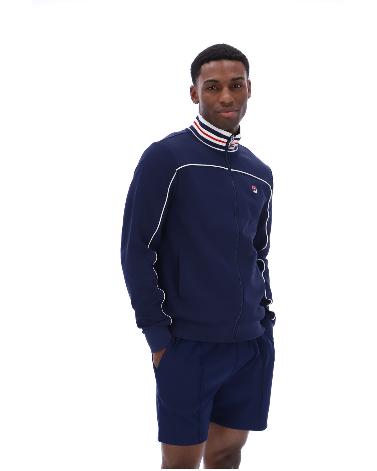Displays a model wearing the Navy 'FILA' Federico Tipped Neck Track Top