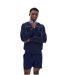 Displays a model wearing the Navy 'FILA' Federico Tipped Neck Track Top