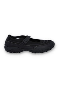 Black shoe with a strap on a white background