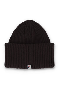 A black ribbed knit beanie hat with a small Fila logo patch on the front cuff, shown against a plain white background.