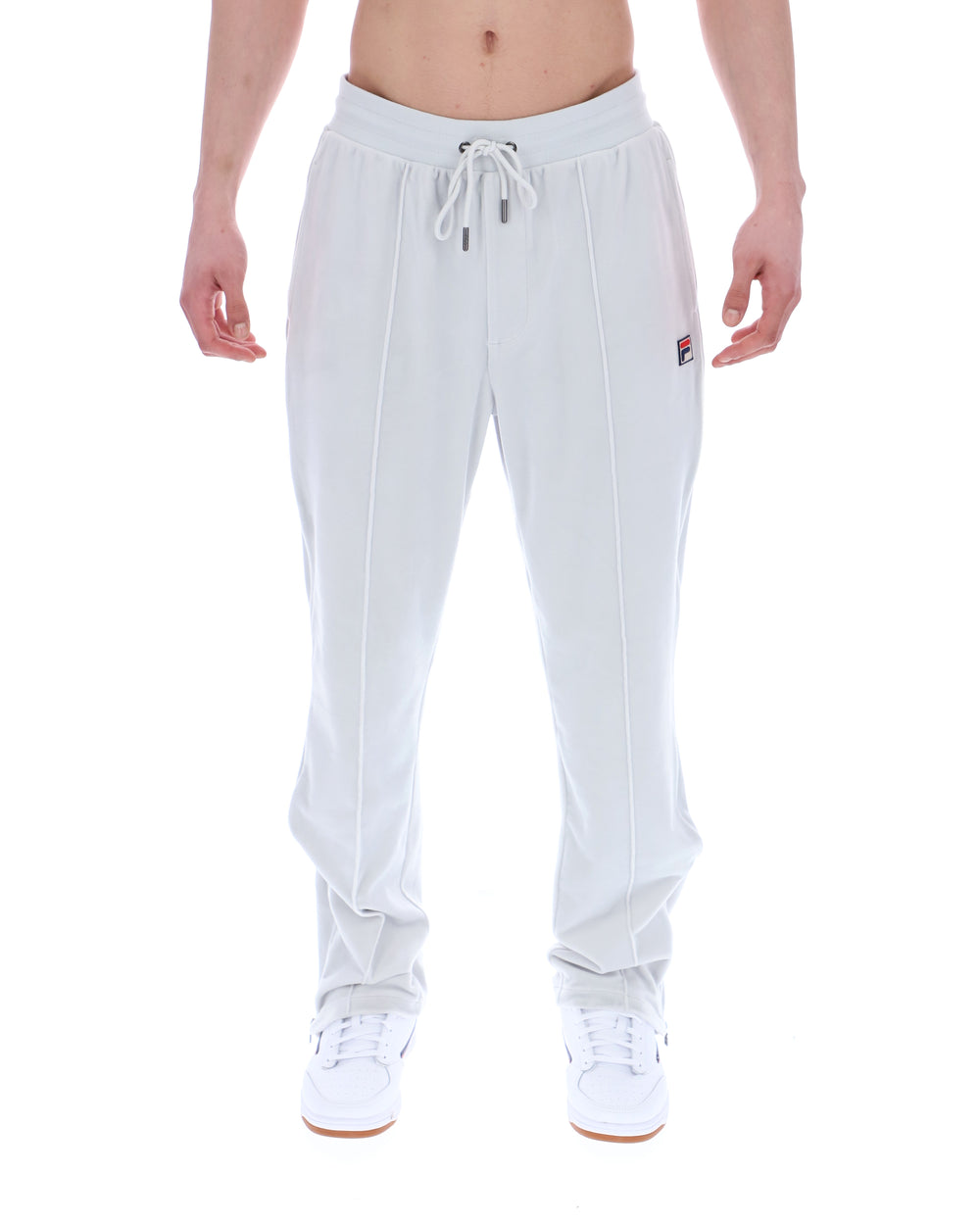 Light Grey jogger pants worn by a person on a white background