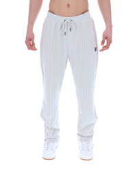 Light Grey jogger pants worn by a person on a white background
