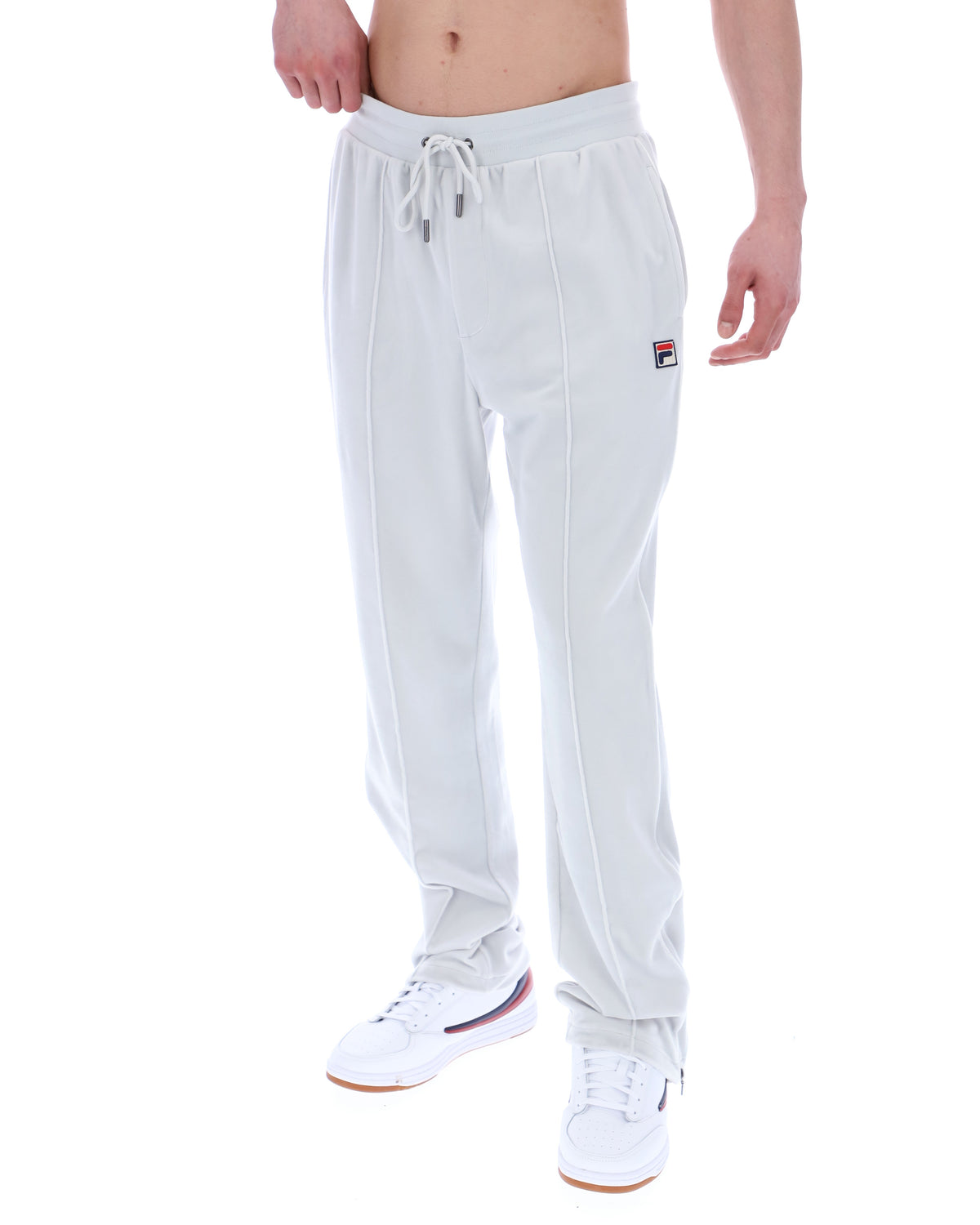 Light Grey jogger pants with a brand logo on a white background
