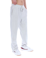 Light Grey jogger pants worn by a person on a white background