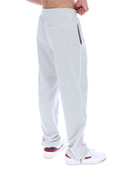 Light Grey pants worn by a person on a white background