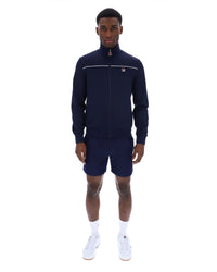 Man wearing a navy tracksuit with a white logo on a white background