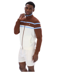 Displays a model wearing the Gardenia 'FILA' branded Giovanni Contrast Panels Track Top