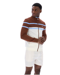 Displays a model wearing the Gardenia 'FILA' branded Giovanni Contrast Panels Track Top