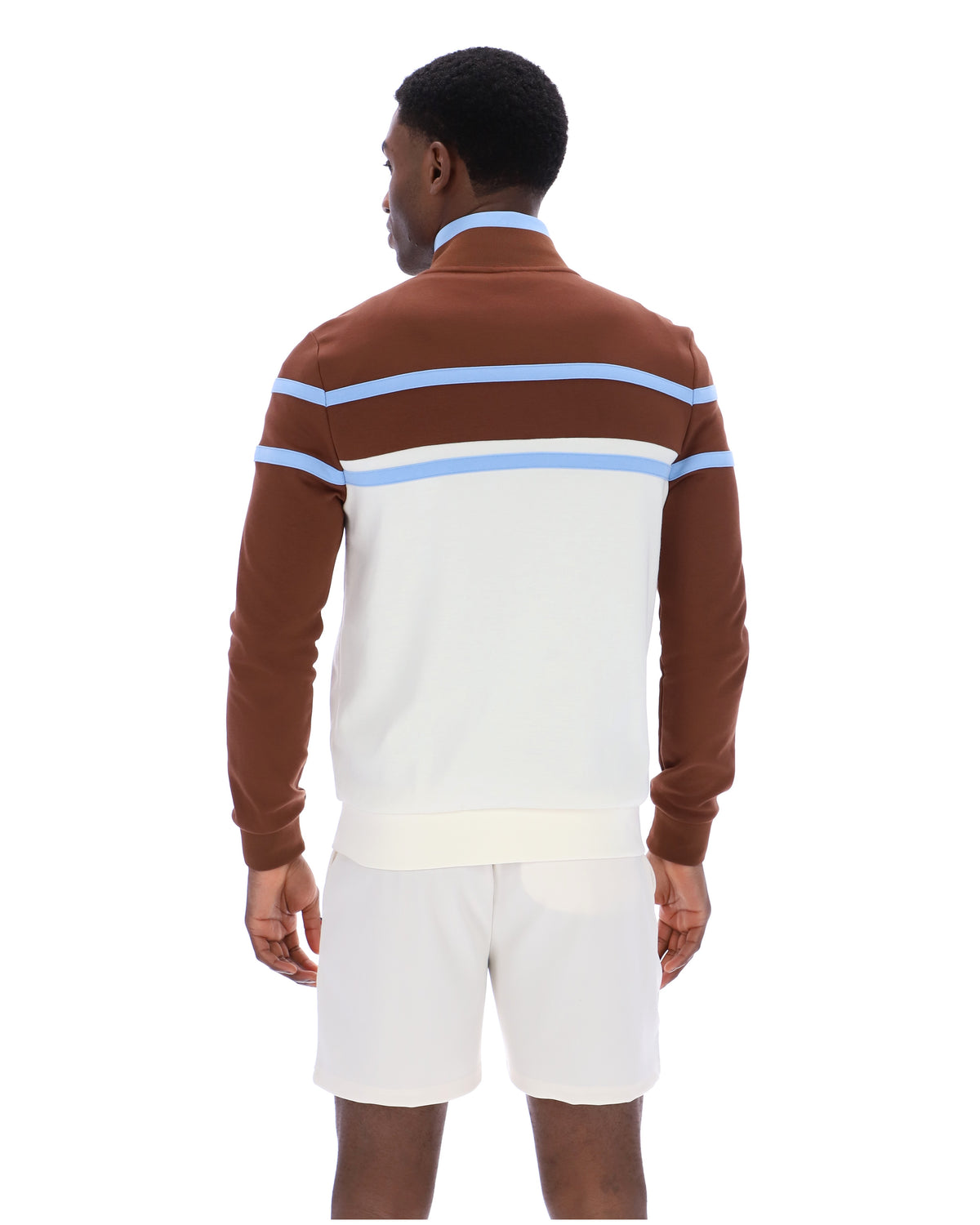 Displays a model wearing the Gardenia 'FILA' branded Giovanni Contrast Panels Track Top