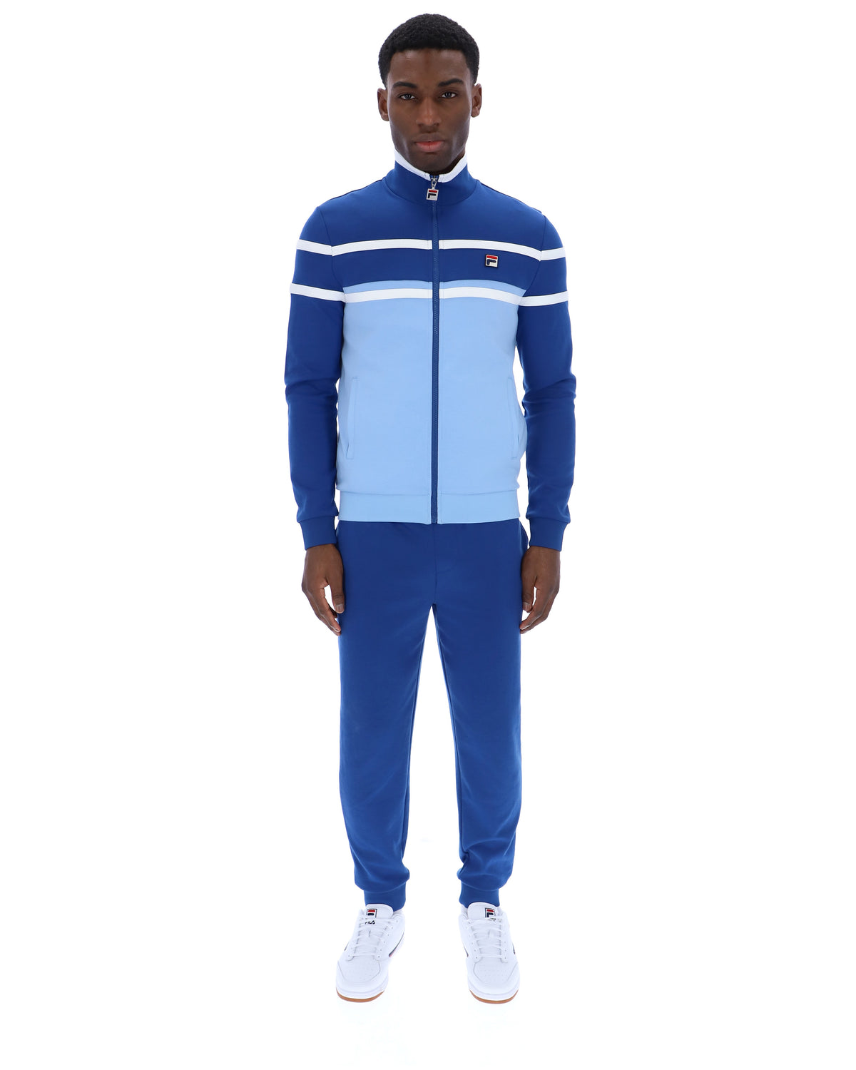 Displays a model wearing the Frozen Fjord 'FILA' branded Giovanni Contrast Panels Track Top