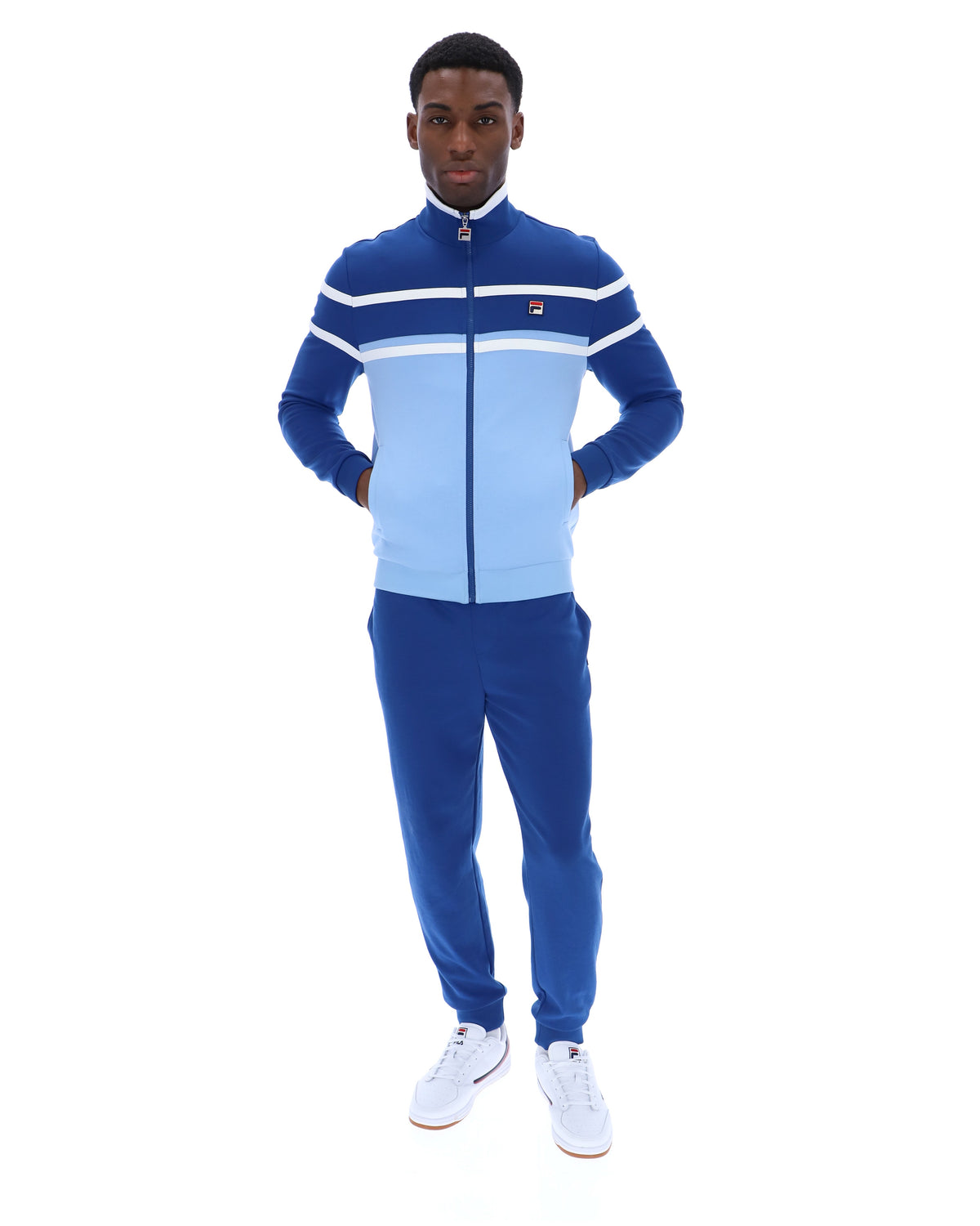 Displays a model wearing the Frozen Fjord 'FILA' branded Giovanni Contrast Panels Track Top