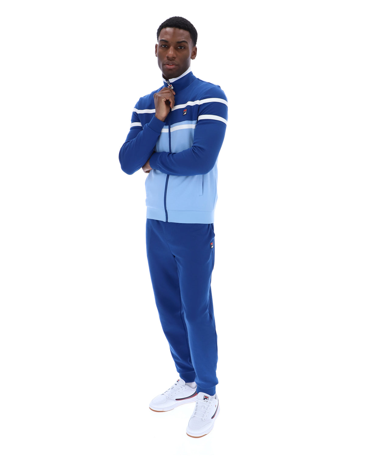Displays a model wearing the Frozen Fjord 'FILA' branded Giovanni Contrast Panels Track Top