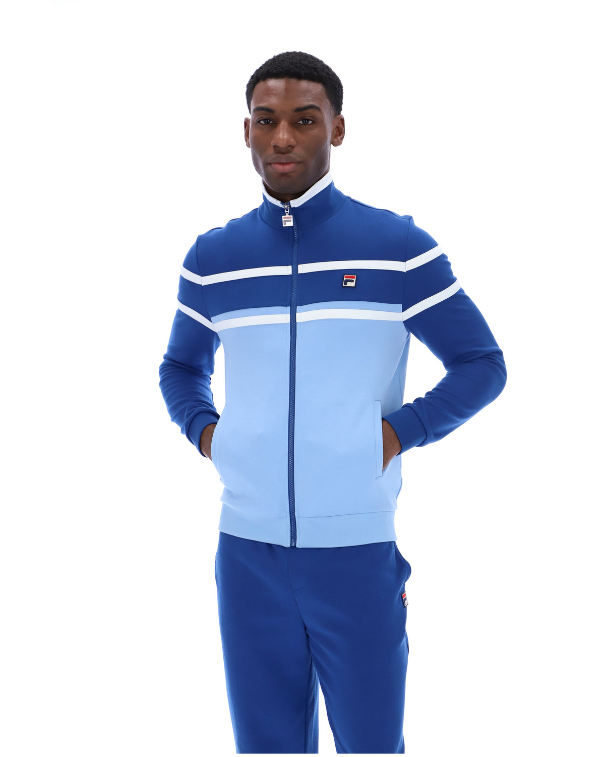 Displays a model wearing the Frozen Fjord 'FILA' branded Giovanni Contrast Panels Track Top