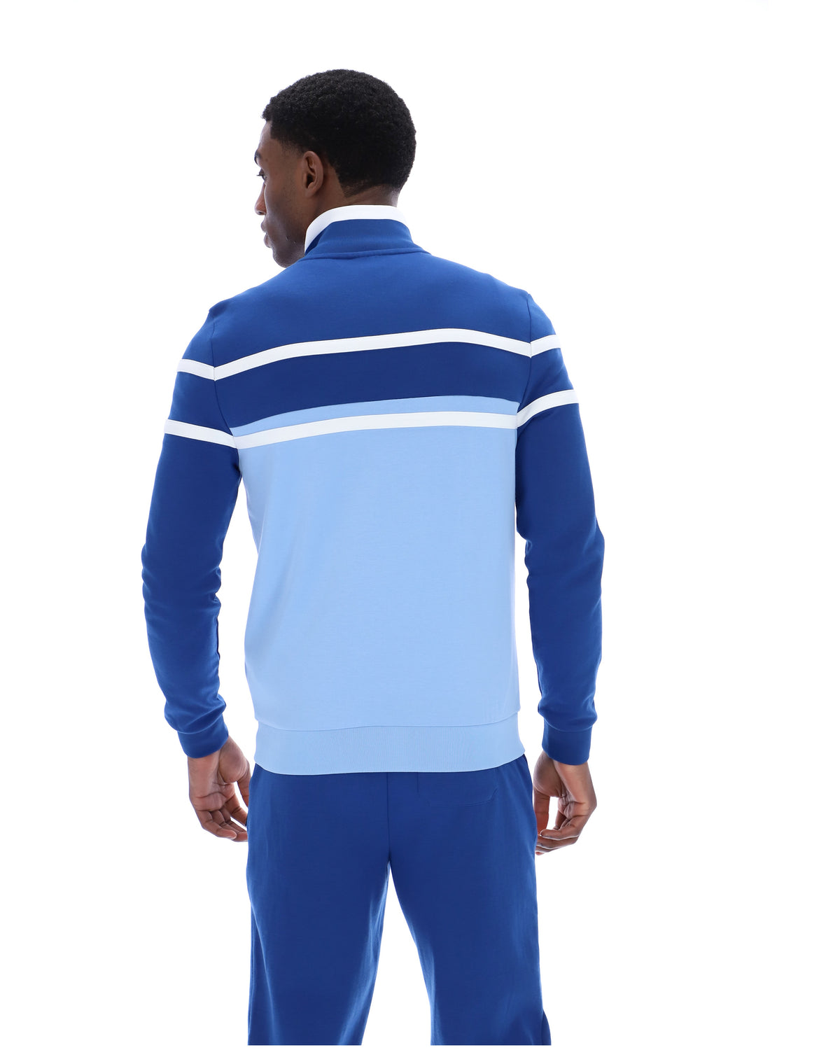 Displays a model wearing the Frozen Fjord 'FILA' branded Giovanni Contrast Panels Track Top