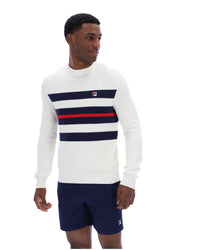 Displays a model wearing the Gardenia 'FILA' branded Giuseppe Mesh Stripe Knitted Crew Neck