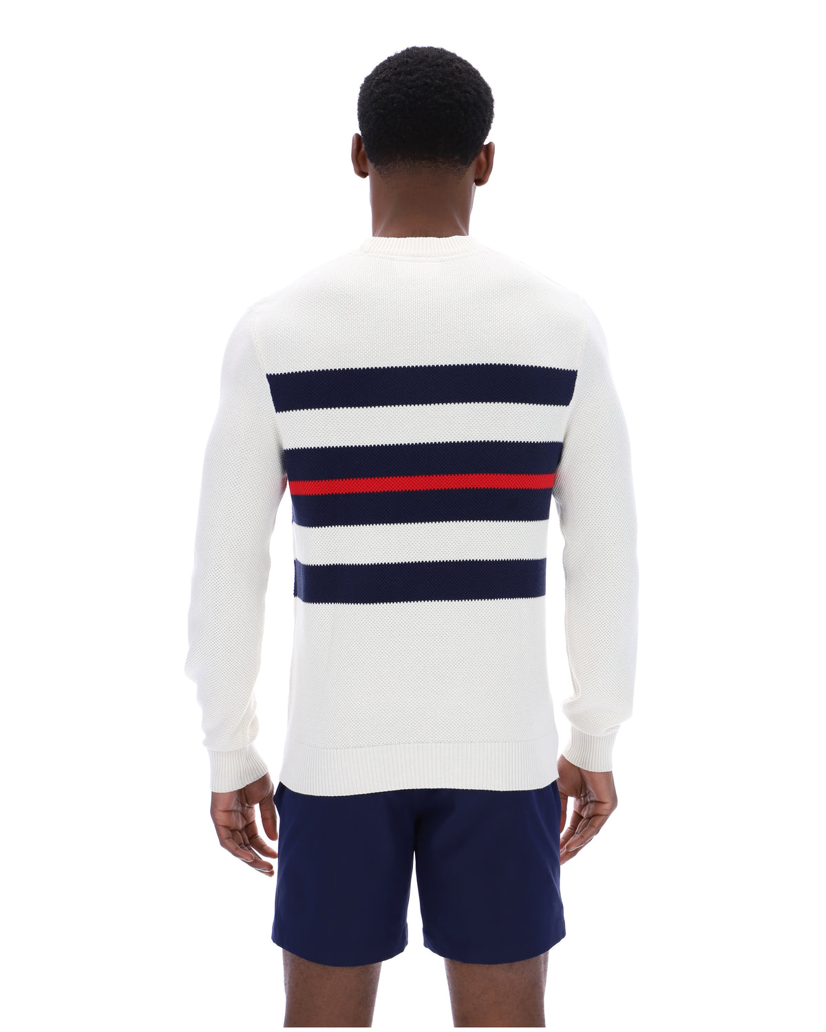 Displays a model wearing the Gardenia 'FILA' branded Giuseppe Mesh Stripe Knitted Crew Neck