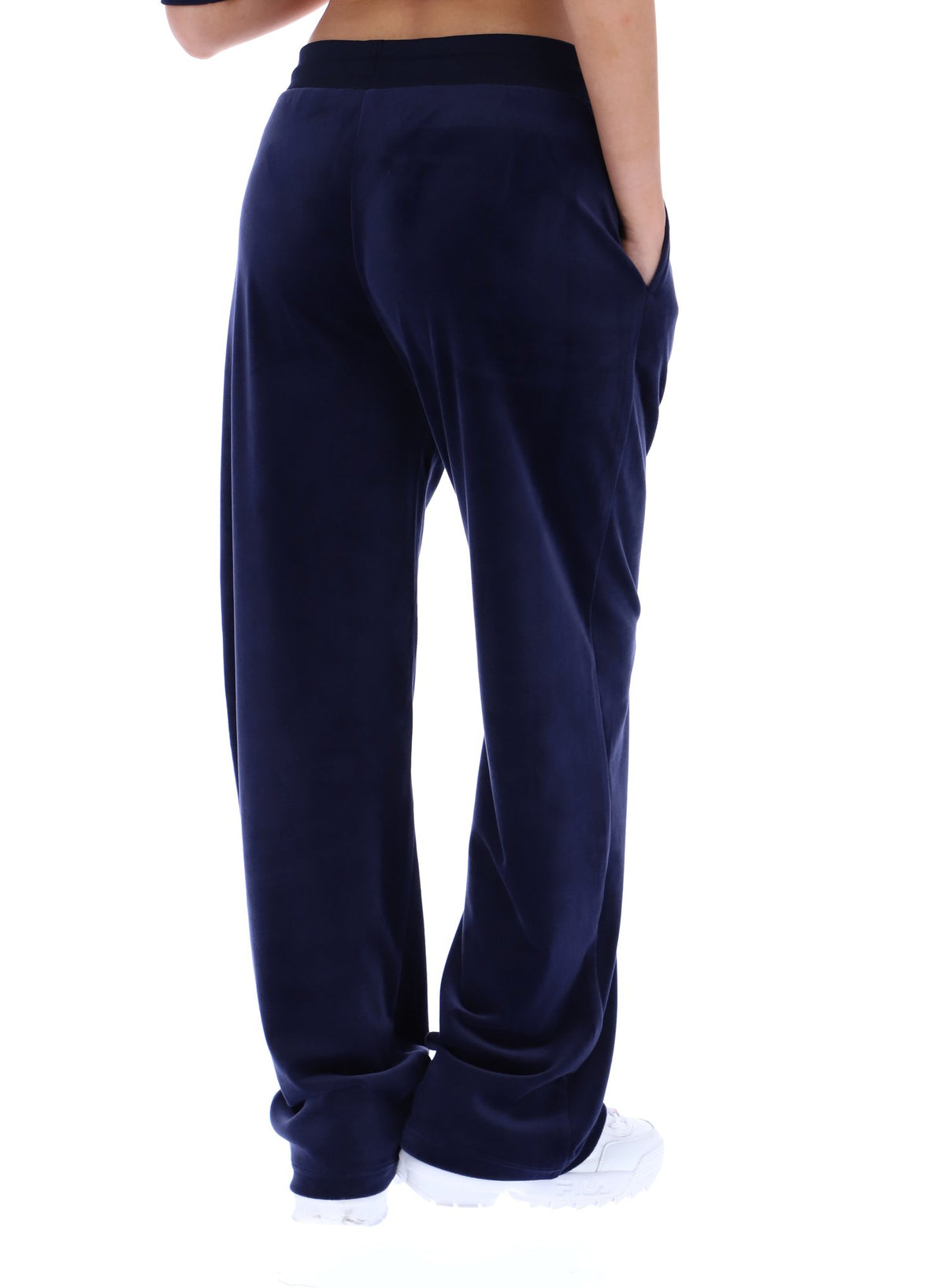 Navy blue sweatpants worn by a person on a white background