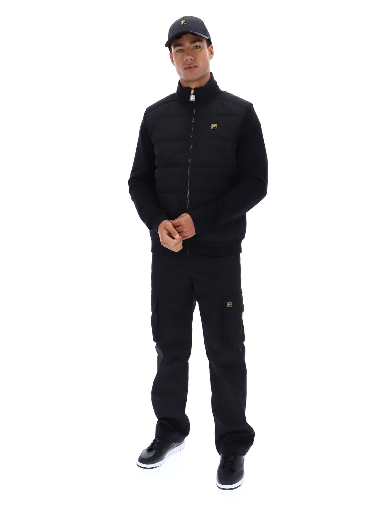 Displays a model wearing the Black 'FILA' branded Jerry Full Zip Padded Jacket
