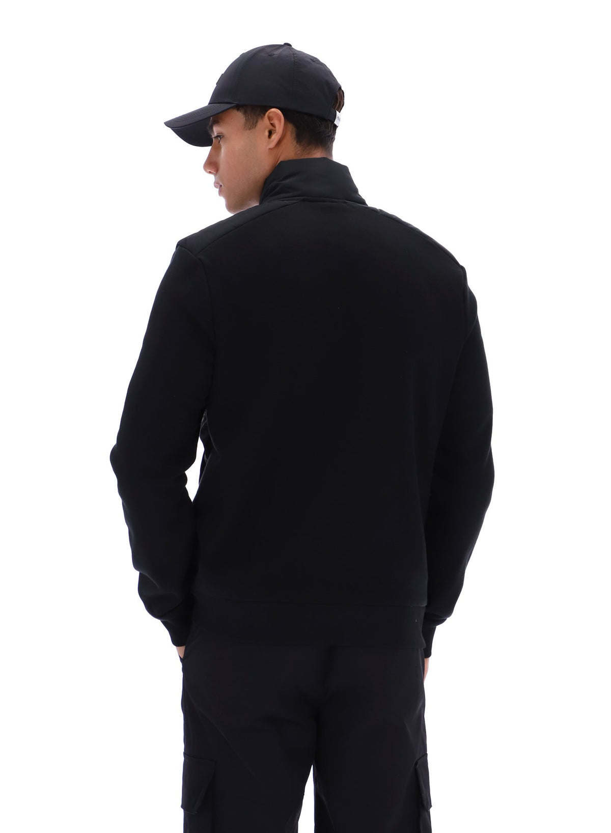 Displays a model wearing the Black 'FILA' branded Jerry Full Zip Padded Jacket