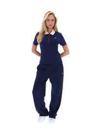 Displays a model wearing the Navy 'FILA' branded Juno Fitted Iconic Polo