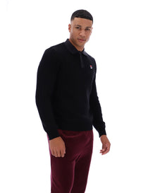 Displays a model wearing the Black 'FILA' branded Kobe Striped Knit Polo