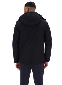 Displays a model wearing the Black 'FILA' branded Liam Cargo Padded Jacket