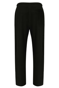 Displays the Black 'FILA' branded Lorrie Velour Track Pant