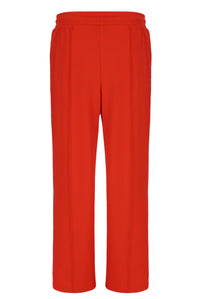 Orange sweatpants on a white background