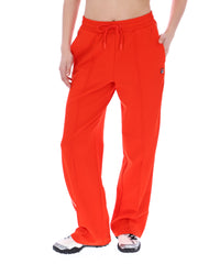 Orange sweatpants with a small FILA logo on a white background