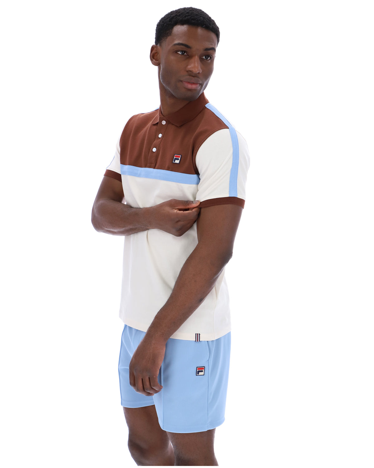Displays a model wearing the Gardenia Mattia 'FILA' branded Contrast Panel Polo Shirt