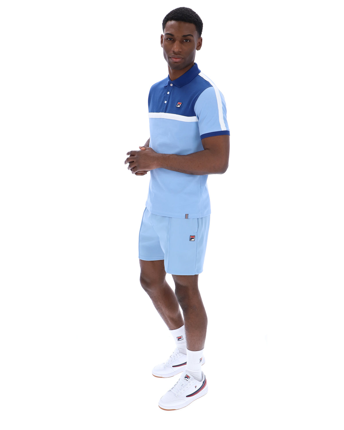 Displays a model wearing the Frozen Fjord 'FILA' branded Mattia Contrast Panel Polo Shirt